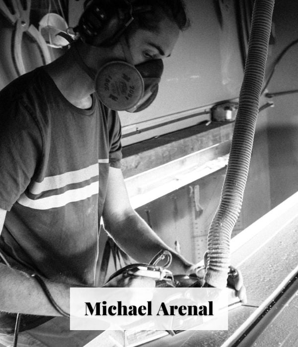 Michael Arenal shaping a surfboard